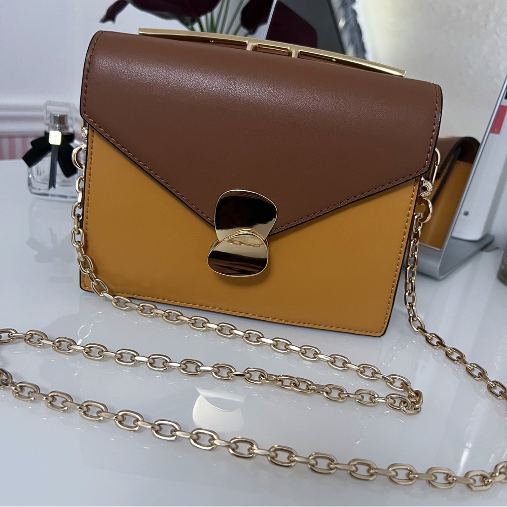 Charles & Keith: Two-Tone Metallic Push Lock Top Handle Crossbody Bag